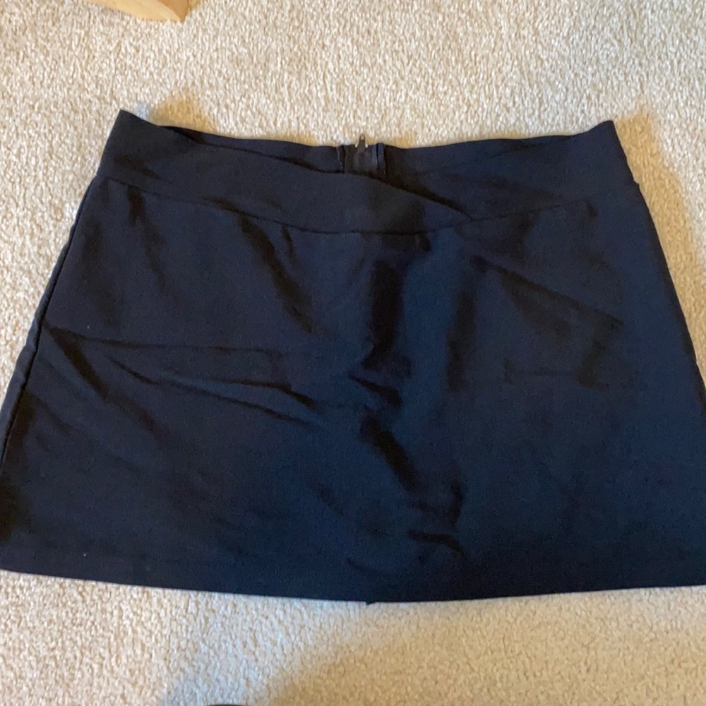 Black skorts. Stretchy. Excellent condition. Girls large.